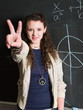 Girl doing peace sign