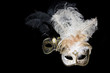 Venetian masks on black background