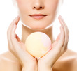 Beautiful young woman with aroma soap