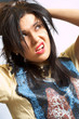 Portrait of a disheveled beautiful woman.
