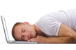 Isolated image lying man on a laptop.