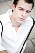 pierced male portrait dressed in white with suspenders pierced male portrait dressed in white with suspenders