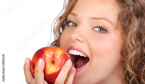 Beautiful young woman eating a red apple. Isolated over white. Beautiful young woman eating a red apple. Isolated over white.