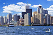 Toronto waterfront with white swans in the harbour Toronto waterfront with white swans in the harbour