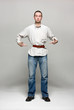 Young man with a belt tightened to the extreme