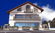 3D render of modern house isolated over blue sky