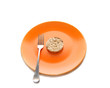 Orange plate with dietery pastry