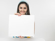 beautiful young woman with a blank placard