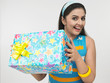 a beautiful smiling woman standing with a gift box a beautiful smiling woman standing with a gift box