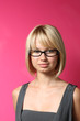 Beautiful businesswoman over pink wall