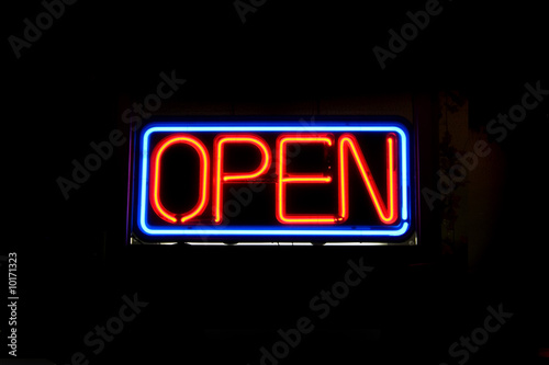 Photo: A neon OPEN sign commonly seen in businesses. A neon OPEN sign commonly seen in businesses.