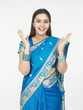 a surprised asian woman of indian origin