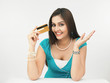 beautiful young asian female with her credit card