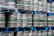 Stacked kegs on blue pallets Stacked kegs on blue pallets