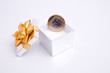 box to gift and coin on the white background