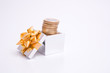 box to gift and coin on the white background