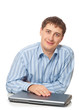 young adult businessman sitting with closed laptop