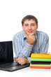 young adult man with books and laptop closeup vertical