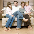 Happy family on sofa