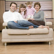 Happy family on sofa