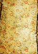old torn floral wallpaper