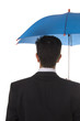 An inurance agent ready to protect you with his umbrella