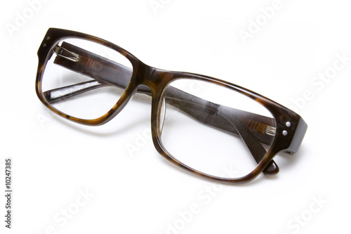 Photo: Mens glasses isolated on a white studio background Mens glasses isolated on a white studio background