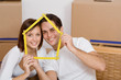 Photo: happy couple in first home happy couple in first home