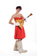 Young smiling woman in a fashionable dress
