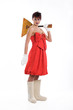 Young woman in a fashionable dress with balalaika
