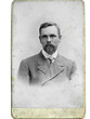 Vintage photo man in the jacket on background.