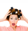 beautiful girl in hair curlers. Isolation