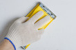 Photographie : Apartment repair. Processing of a wall by an sandpaper.