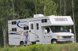 Big Motorhome with owner in the woods, Canada Big Motorhome with owner in the woods, Canada