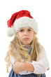 einen kleines mädchen mit weihnachtsmütze eingeschnappt