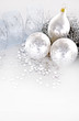 beautiful silver seasonal Christmas decorations on background