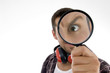 man with his magnified eye on an isolated white background