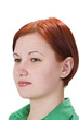 Portrait of a redheaded girl with pierced nose and ear