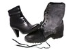 Military male boot and elegant female shoe