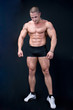The Perfect male body isolated on black background