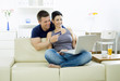 Couple shopping on internet paying by credit card. Couple shopping on internet paying by credit card.