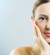 Half face of young woman.