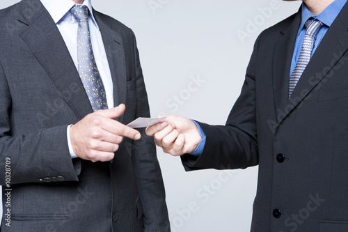 Photo: Exchanging business cards Exchanging business cards