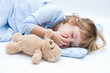 child with teddy bear, sleeping and crying
