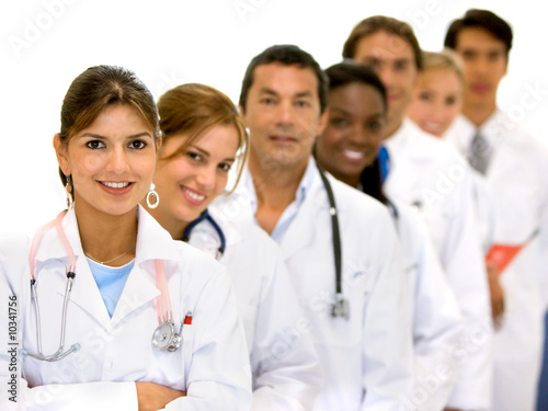Photo: group of doctors in a hospital in a line group of doctors in a hospital in a line