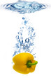 yellow pepper are dropped into water