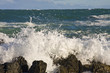 Waves breaking on the rocks on a beach in New Zealand Waves breaking on the rocks on a beach in New Zealand