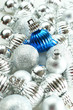 Silver christmas ball and a blue one