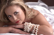 Sensual naked young blonde adult Caucasian woman