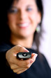 Photo: Woman with remote control Woman with remote control